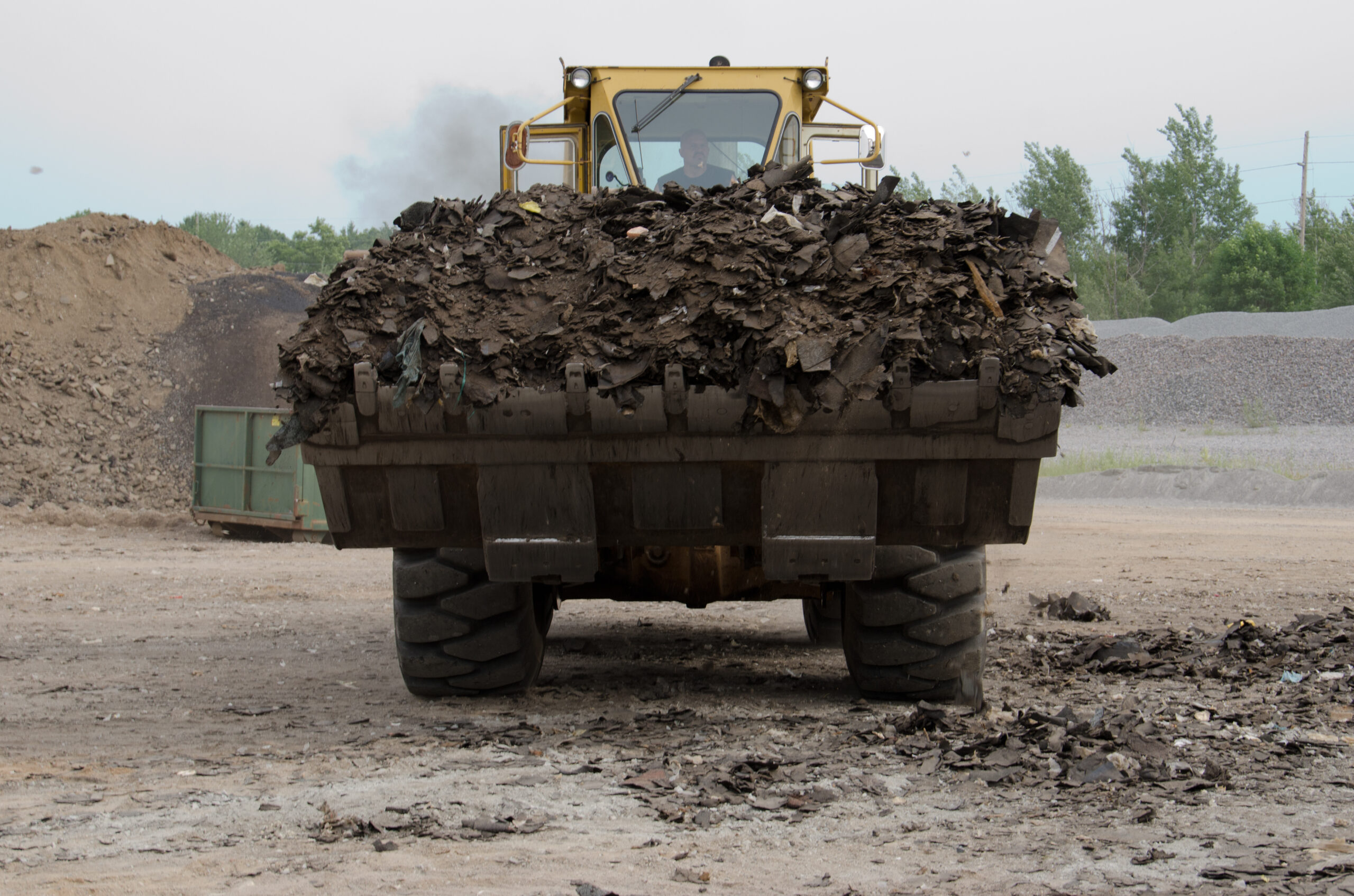 From rooftops to roads: Recycling shingles